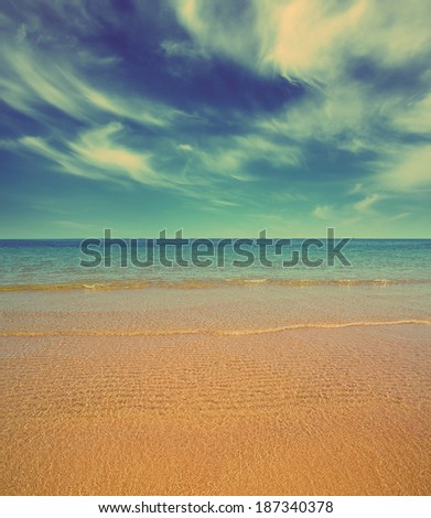 beautiful landscape with gold sand beach and sea - vintage retro style