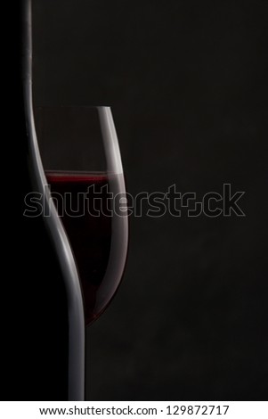 Silhouette of a Bottle and Red Wine Glass