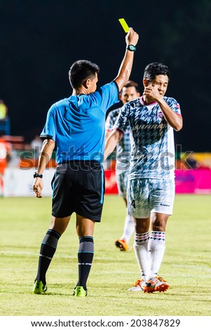 SISAKET THAILAND-JULY 6: The referee (blue) show the yellow card during Thai Premier League between Sisaket FC and Chainat Hornbill FC at Sri Nakhon Lamduan Stadium on July 6,2014,Thailand