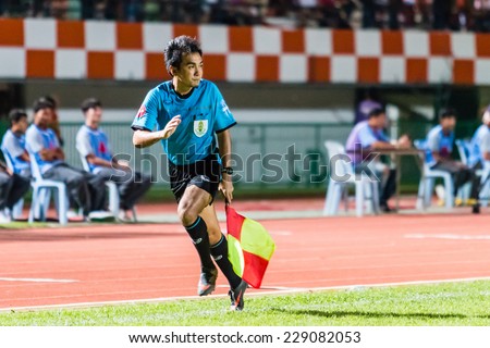 SISAKET THAILAND-OCTOBER 29: Lineman in action during Thai Premier League match between Sisaket FC and Army Utd at  Sri Nakhon Lamduan Stadium on October 29,2014,Thailand