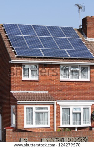 Solar photovoltaic panels on house roof