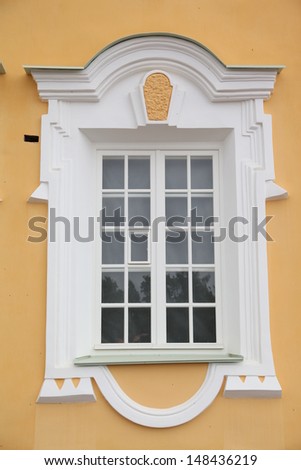 Palace window on yellow wall