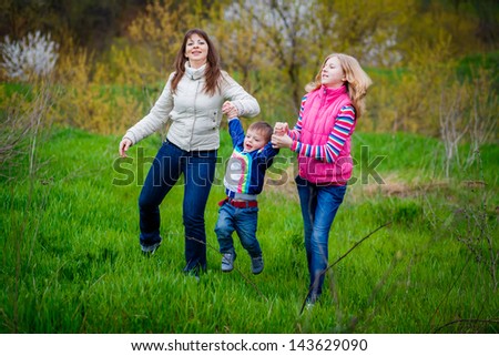 Family walk in the spring garden