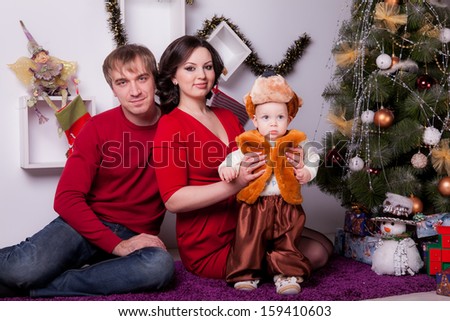 family near the Christmas tree