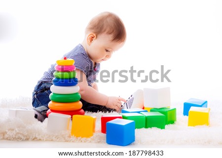 Similar – Image, Stock Photo Caucasian blonde baby seven months old lying on bed at home. Kid wearing cute clothing yellow color