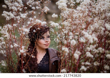 beautiful girl in the autumn forest. relax in nature. Outdoors