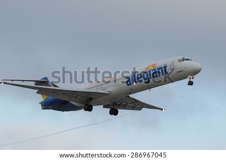LOS ANGELES, CA/USA - JUNE 14 2015: Allegiant Air MD-82 (reg N420NV) arriving at the Los Angeles World Airport (LAX).