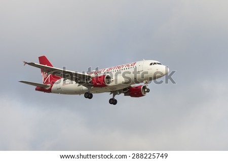 LOS ANGELES, CA/USA - JUNE 6 2015: Virgin America \'Fog Cutter\' Airbus A319 (reg N528VA) arriving at the Los Angeles World Airport (LAX). Virgin America, Inc. is a USA-based airline.