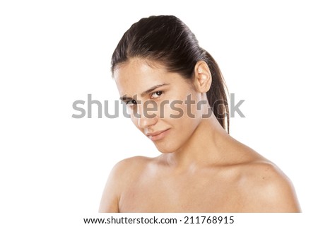 portrait of a smiling girl with no makeup on white background