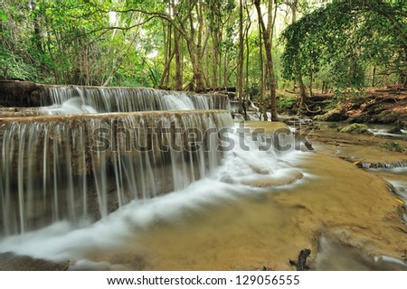 Waterfall  in spring season located in deep rain forest jungle