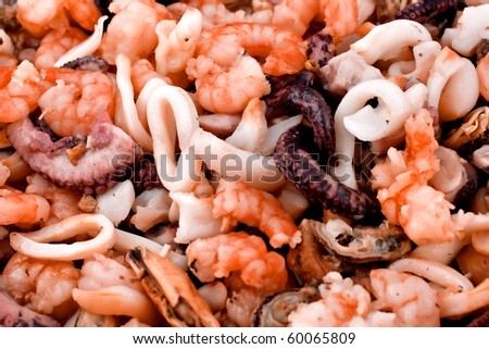 seafood salad with prawns , squids , oysters and mussels