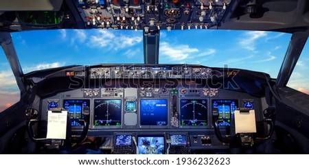 Cockpit pilot Flight Deck display. Throttle jet cabin with control panel plane. View in windows blue sky clouds