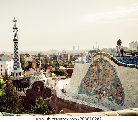 mosaic bench on stone gallery in the park Guell in Barcelona, Spain. Vintage retro style