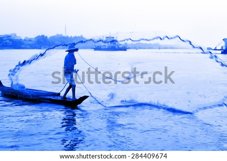 Fisherman net in boat landscape Mekong