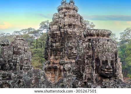 stone faces sculpture Bayon Temple Angkor Thom, Cambodia. Ancient Khmer architecture.