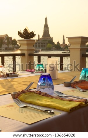 dinner table on side river, BAngkok/THAILAND