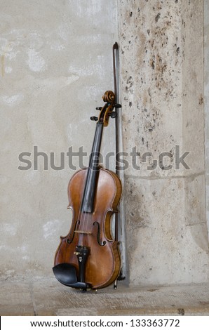 a violin of a street musician on streets of budapest hungary