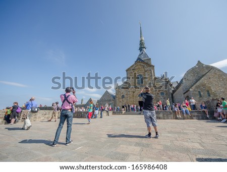 FRANCE LE MONT SAINT MICHEL 26 AUG: view of the church on the top of hill of le mont saint michel on 26 August 2013. It is one of France\'s most recognisable landmarks