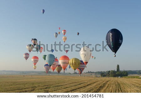 FRANCE BRISSAC-QUINCE 30 AUG: view of hot air baloons flying over fields near BRISSAC-QUINCE town on 30 august 2013
