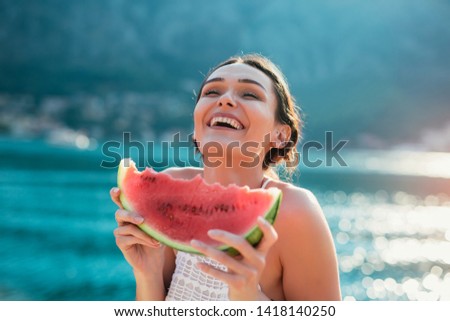 Similar – Image, Stock Photo Woman eating watermelon