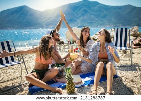Similar – Image, Stock Photo Cheerful traveling woman on beach during summer vacation