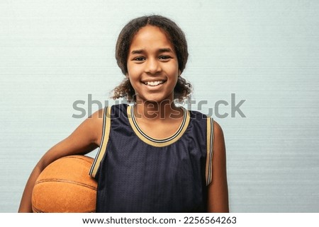 Similar – Image, Stock Photo Confident basketball player standing on playground