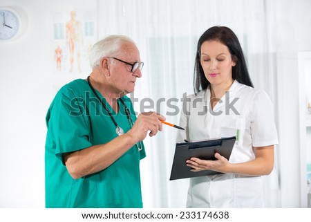 Old doctor and a nurse are consulted