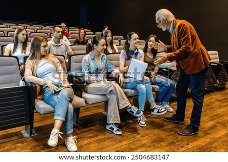 Similar – Image, Stock Photo Friends in amphitheater with television tower
