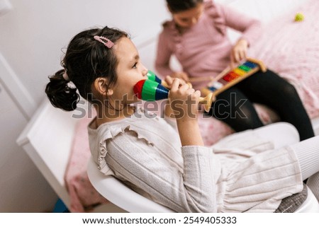 Similar – Image, Stock Photo Disabled girl in a wheelchair talking on her cell phone