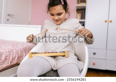 Similar – Image, Stock Photo Disabled girl in a wheelchair talking on her cell phone