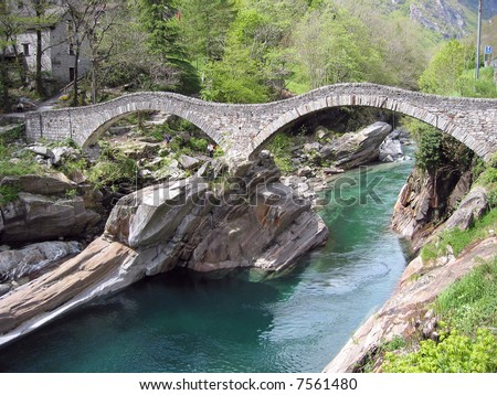 Ancient double arch stone bridge in Verzasca valley, Switzerland