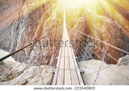 Trift Bridge, the longest 170m pedestrian-only suspension bridge in the Alps. Switzerland