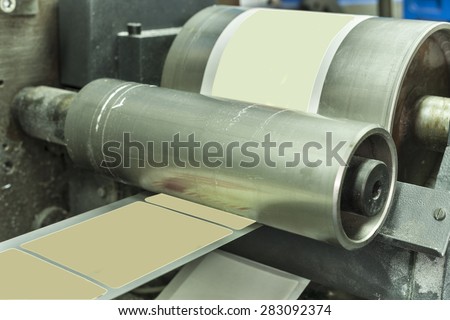 Printing at high speed on offset machine. Label, Rolled Up, Printing Out, Group of Objects, Merchandise