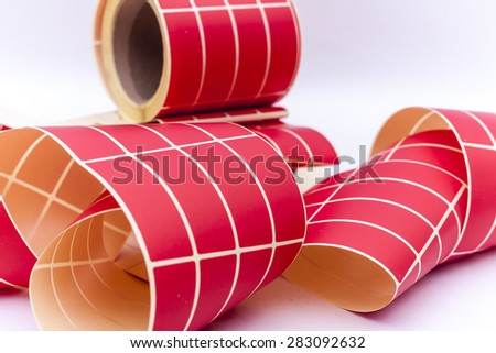 Variety of labels on a roll for customer or company info, logos, color schemes removed