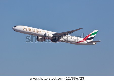 NEW YORK - DECEMBER 9:Boeing 777 Emirates climbs after take off from JFK Airport in New York on December 9, 2012. Emirates is rated as a top 10 best airlines in the world flying on youngest fleet