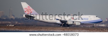 NEW YORK - JANUARY 6: A Boeing 747 cargo plane, China Airlines Cargo departs from JFK Airport Runway 4L on January 6, 2010 in New York.