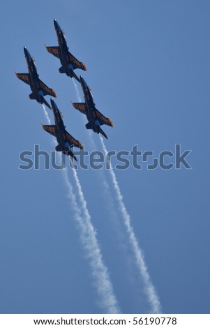 WASHINGTON DC, ANDREWS AFB- MAY 15: US Navy Demonstration Squadron Blue angels, flying on Boeing F/A-18 showing precision of flying and the highest level of pilot skills on May 15, 2010 in Washington DC.