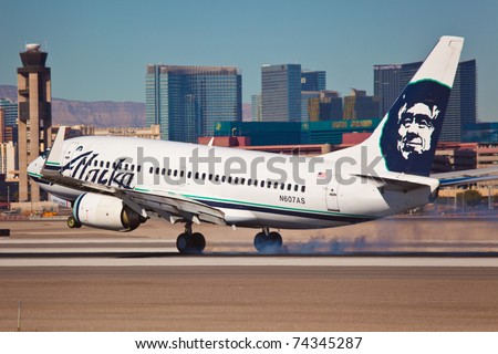 LAS VEGAS - NOVEMBER 15: Boeing 767 Alaska Airline touching down on McCarran in Las Vegas, USA on November 15, 2010. Alaska\'s route system spans more than 92 cities in United States, Canada, and Mexico