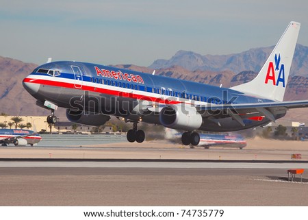 LAS VEGAS - NOVEMBER 14: Boeing 737 American Airline lands on McCarran airport in Las Vegas, USA on November 14, 2010. American Airlines is one of the biggest and oldest major American airlines
