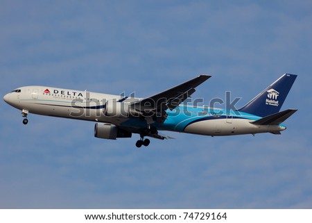 NEW YORK - MARCH 5:Delta Boeing 767 on approach to JFK in New York, USA on march 5, 2011. The plane is wearing special livery called Habitat for Humanity the worldwide active humanitarian organization