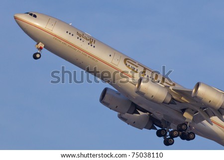 NEW YORK - MARCH 10: Airbus A340-600 of Etihad approaching JFK in New York, USA on March 10, 2011. Etihad is one of the most expensive and rated top 5 best airlines in the world