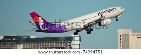 LAS VEGAS - NOVEMBER 12: A330 Hawaiian climb after take off from McCarran in Las Vegas on November 12, 2010. Hawaiian Airlines are the only airlines based in Hawaii serve international flights