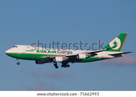 NEW YORK - JANUARY 5: A Boeing 747-400 (B-16483) EVA AIR Cargo from China Arriving at JFK runway 22R on January 5, 2010 in New York, NY.  The Boeing 747 is a long-range, wide-body jumbo jet airliner