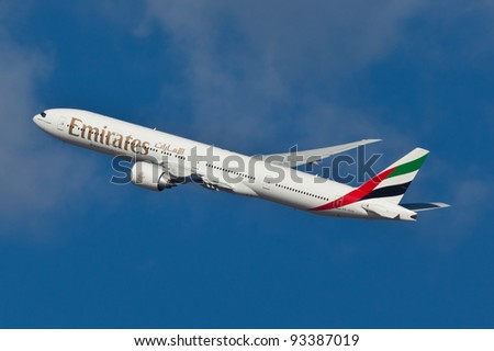 NEW YORK - JANUARY 10: Boeing 777 Emirates climbs after take off from JFK airport located in New York January 10, 2012 Emirates is rated as a top10 best airline in the world flying on youngest fleet