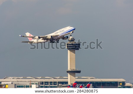 NEW YORK - NOVEMBER 2: Boeing 747 China Airlines takes off from JFK Airport in New York, USA on November 2, 2013. China Airlines is the flag carrier of the Republic of China, commonly known as Taiwan.