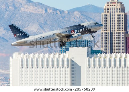 LAS VEGAS - NOVEMBER 3: Airbus A320 Spirit Airlines takes off from McCarran Airport in Las Vegas, NV on November 3, 2014. Spirit is a ultra low-cost carrier. It is rated 2 out of 5 starts by Skytrax.