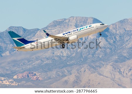 LAS VEGAS - NOVEMBER 3: Boeing 737 West Jet Airlines takes off from McCarran Airport in Las Vegas, NV on November 3, 2014. WestJet is a Canadian low-cost carrier and second-largest, behind Air Canada.