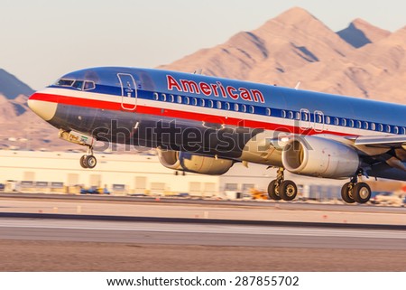 LAS VEGAS - NOVEMBER 3: Boeing 737 American Airlines lands at McCarran Airport in Las Vegas, NV on November 3, 2014. American Airlines is one of the oldest airlines in United States.