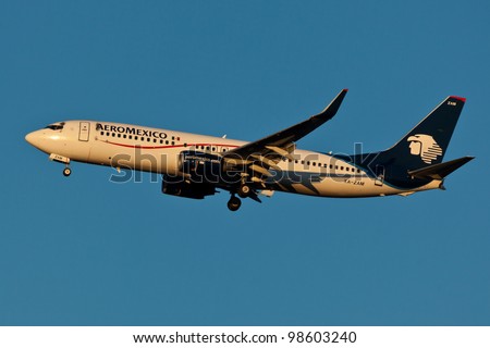 NEW YORK - MARCH 10: Boeing 737 Aeromexico climbs after take off from JFK in New York, USA on March 10, 2012. Aeromexico is the flag carrier airline of Mexico and the biggest Mexican Airline