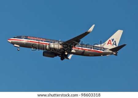 NEW YORK - MARCH 16:Boeing 737 American Airline approaching JFK in New York, USA on March 16, 2012. American Airline is on of the oldest American airlines and one of the biggest in the world